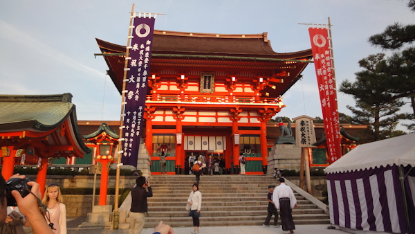 the main shrine building at the top of stone steps
